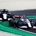 BARCELONA, SPAIN - MAY 07: Antonio Giovinazzi of Italy driving the (99) Alfa Romeo Racing C41 Ferrari leads George Russell of Great Britain driving the (63) Williams Racing FW43B Mercedes during practice for the F1 Grand Prix of Spain at Circuit de Barcelona-Catalunya on May 07, 2021 in Barcelona, Spain. (Photo by Bryn Lennon/Getty Images)