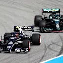 BARCELONA, SPAIN - MAY 09: Pierre Gasly of France driving the (10) Scuderia AlphaTauri AT02 Honda leads Sebastian Vettel of Germany driving the (5) Aston Martin AMR21 Mercedes on track during the F1 Grand Prix of Spain at Circuit de Barcelona-Catalunya on May 09, 2021 in Barcelona, Spain. (Photo by Bryn Lennon/Getty Images)