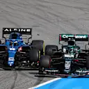 BARCELONA, SPAIN - MAY 09: Lance Stroll of Canada driving the (18) Aston Martin AMR21 Mercedes and Fernando Alonso of Spain driving the (14) Alpine A521 Renault battle for position during the F1 Grand Prix of Spain at Circuit de Barcelona-Catalunya on May 09, 2021 in Barcelona, Spain. (Photo by Bryn Lennon/Getty Images)