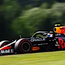 SPIELBERG, AUSTRIA - JUNE 25: Sergio Perez of Mexico driving the (11) Red Bull Racing RB16B Honda on track during practice ahead of the F1 Grand Prix of Styria at Red Bull Ring on June 25, 2021 in Spielberg, Austria. (Photo by Clive Rose/Getty Images)