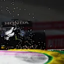 SPIELBERG, AUSTRIA - JUNE 25: Sparks fly behind Yuki Tsunoda of Japan driving the (22) Scuderia AlphaTauri AT02 Honda on track during practice ahead of the F1 Grand Prix of Styria at Red Bull Ring on June 25, 2021 in Spielberg, Austria. (Photo by Mario Renzi - Formula 1/Formula 1 via Getty Images)