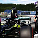 SPIELBERG, AUSTRIA - JUNE 26: Third place qualifier Lewis Hamilton of Great Britain and Mercedes GP inspects his car in parc ferme during qualifying ahead of the F1 Grand Prix of Styria at Red Bull Ring on June 26, 2021 in Spielberg, Austria. (Photo by Dan Istitene - Formula 1/Formula 1 via Getty Images)