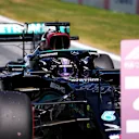 SPIELBERG, AUSTRIA - JUNE 26: Third place qualifier Lewis Hamilton of Great Britain and Mercedes GP stops in parc ferme during qualifying ahead of the F1 Grand Prix of Styria at Red Bull Ring on June 26, 2021 in Spielberg, Austria. (Photo by Darko Vojinovic - Pool/Getty Images)