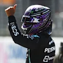 SPIELBERG, AUSTRIA - JUNE 26: Third place qualifier Lewis Hamilton of Great Britain and Mercedes GP waves to the crowd from parc ferme during qualifying ahead of the F1 Grand Prix of Styria at Red Bull Ring on June 26, 2021 in Spielberg, Austria. (Photo by Bryn Lennon/Getty Images)