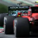 SPIELBERG, AUSTRIA - JUNE 27: Lance Stroll of Canada driving the (18) Aston Martin AMR21 Mercedes leads Carlos Sainz of Spain driving the (55) Scuderia Ferrari SF21 during the F1 Grand Prix of Styria at Red Bull Ring on June 27, 2021 in Spielberg, Austria. (Photo by Bryn Lennon/Getty Images)