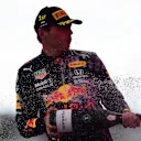 SPIELBERG, AUSTRIA - JUNE 27: Race winner Max Verstappen of Netherlands and Red Bull Racing celebrates on the podium during the F1 Grand Prix of Styria at Red Bull Ring on June 27, 2021 in Spielberg, Austria. (Photo by Mario Renzi - Formula 1/Formula 1 via Getty Images)