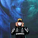 SPIELBERG, AUSTRIA - JUNE 27: Second placed Lewis Hamilton of Great Britain and Mercedes GP celebrates on the podium during the F1 Grand Prix of Styria at Red Bull Ring on June 27, 2021 in Spielberg, Austria. (Photo by Clive Mason - Formula 1/Formula 1 via Getty Images)