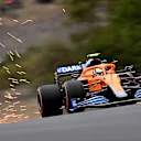 ISTANBUL, TURKEY - OCTOBER 09: Sparks fly behind Lando Norris of Great Britain driving the (4) McLaren F1 Team MCL35M Mercedes during qualifying ahead of the F1 Grand Prix of Turkey at Intercity Istanbul Park on October 09, 2021 in Istanbul, Turkey. (Photo by Clive Mason - Formula 1/Formula 1 via Getty Images)