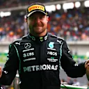 ISTANBUL, TURKEY - OCTOBER 10: Race winner Valtteri Bottas of Finland and Mercedes GP celebrates on the podium during the F1 Grand Prix of Turkey at Intercity Istanbul Park on October 10, 2021 in Istanbul, Turkey. (Photo by Dan Istitene - Formula 1/Formula 1 via Getty Images)