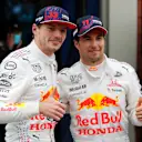 ISTANBUL, TURKEY - OCTOBER 10: Second placed Max Verstappen of Netherlands and Red Bull Racing and third placed Sergio Perez of Mexico and Red Bull Racing celebrate in parc ferme during the F1 Grand Prix of Turkey at Intercity Istanbul Park on October 10, 2021 in Istanbul, Turkey. (Photo by Umit Bektas - Pool/Getty Images)