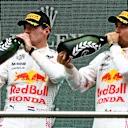 ISTANBUL, TURKEY - OCTOBER 10: Second placed Max Verstappen of Netherlands and Red Bull Racing and third placed Sergio Perez of Mexico and Red Bull Racing celebrate on the podiumduring the F1 Grand Prix of Turkey at Intercity Istanbul Park on October 10, 2021 in Istanbul, Turkey. (Photo by Mark Thompson/Getty Images)