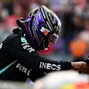 AUSTIN, TEXAS - OCTOBER 23: Second place qualifier Lewis Hamilton of Great Britain and Mercedes GP looks on in parc ferme during qualifying ahead of the F1 Grand Prix of USA at Circuit of The Americas on October 23, 2021 in Austin, Texas. (Photo by Mario Renzi - Formula 1/Formula 1 via Getty Images)