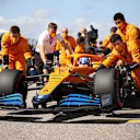 AUSTIN, TEXAS - OCTOBER 24: Lando Norris of Great Britain and McLaren F1 prepares to drive on the grid during the F1 Grand Prix of USA at Circuit of The Americas on October 24, 2021 in Austin, Texas. (Photo by Chris Graythen/Getty Images)