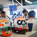 ABU DHABI, UNITED ARAB EMIRATES - NOVEMBER 18: Yuki Tsunoda of Japan and Scuderia AlphaTauri prepares to drive in the garage during practice ahead of the F1 Grand Prix of Abu Dhabi at Yas Marina Circuit on November 18, 2022 in Abu Dhabi, United Arab Emirates. (Photo by Rudy Carezzevoli/Getty Images)