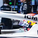 ABU DHABI, UNITED ARAB EMIRATES - NOVEMBER 18: Pierre Gasly of France and Scuderia AlphaTauri prepares to drive in the garage during practice ahead of the F1 Grand Prix of Abu Dhabi at Yas Marina Circuit on November 18, 2022 in Abu Dhabi, United Arab Emirates. (Photo by Rudy Carezzevoli/Getty Images)