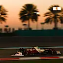 ABU DHABI, UNITED ARAB EMIRATES - NOVEMBER 18: Zhou Guanyu of China driving the (24) Alfa Romeo F1 C42 Ferrari on track during practice ahead of the F1 Grand Prix of Abu Dhabi at Yas Marina Circuit on November 18, 2022 in Abu Dhabi, United Arab Emirates. (Photo by Mark Thompson/Getty Images)