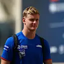 ABU DHABI, UNITED ARAB EMIRATES - NOVEMBER 19: Mick Schumacher of Germany and Haas F1 walks in the paddock during final practice ahead of the F1 Grand Prix of Abu Dhabi at Yas Marina Circuit on November 19, 2022 in Abu Dhabi, United Arab Emirates. (Photo by Rudy Carezzevoli/Getty Images)