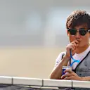 ABU DHABI, UNITED ARAB EMIRATES - NOVEMBER 20: Yuki Tsunoda of Japan and Scuderia AlphaTauri looks on from the drivers parade prior to the F1 Grand Prix of Abu Dhabi at Yas Marina Circuit on November 20, 2022 in Abu Dhabi, United Arab Emirates. (Photo by Mark Thompson/Getty Images)