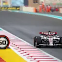 ABU DHABI, UNITED ARAB EMIRATES - NOVEMBER 20: Valtteri Bottas of Finland driving the (77) Alfa Romeo F1 C42 Ferrari on their way to the grid prior to the F1 Grand Prix of Abu Dhabi at Yas Marina Circuit on November 20, 2022 in Abu Dhabi, United Arab Emirates. (Photo by Joe Portlock - Formula 1/Formula 1 via Getty Images)