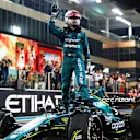 ABU DHABI, UNITED ARAB EMIRATES - NOVEMBER 20: Tenth placed Sebastian Vettel of Germany and Aston Martin F1 Team waves to the crowd following his final race in F1 during the F1 Grand Prix of Abu Dhabi at Yas Marina Circuit on November 20, 2022 in Abu Dhabi, United Arab Emirates. (Photo by Dan Istitene - Formula 1/Formula 1 via Getty Images)