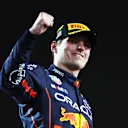 ABU DHABI, UNITED ARAB EMIRATES - NOVEMBER 20: Race winner Max Verstappen of the Netherlands and Oracle Red Bull Racing celebrates on the podium following the F1 Grand Prix of Abu Dhabi at Yas Marina Circuit on November 20, 2022 in Abu Dhabi, United Arab Emirates. (Photo by Mark Thompson/Getty Images)