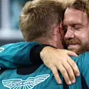 ABU DHABI, UNITED ARAB EMIRATES - NOVEMBER 20: Tenth placed Sebastian Vettel of Germany and Aston Martin F1 Team celebrates with team members following his final race in F1 during the F1 Grand Prix of Abu Dhabi at Yas Marina Circuit on November 20, 2022 in Abu Dhabi, United Arab Emirates. (Photo by Dan Istitene - Formula 1/Formula 1 via Getty Images)