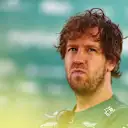 MELBOURNE, AUSTRALIA - APRIL 08: Sebastian Vettel of Germany and Aston Martin F1 Team looks on in the Paddock prior to practice ahead of the F1 Grand Prix of Australia at Melbourne Grand Prix Circuit on April 08, 2022 in Melbourne, Australia. (Photo by Dan Istitene - Formula 1/Formula 1 via Getty Images)