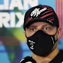 MELBOURNE, AUSTRALIA - APRIL 08: Valtteri Bottas of Finland and Alfa Romeo F1 talks in the Drivers Press Conference prior to practice ahead of the F1 Grand Prix of Australia at Melbourne Grand Prix Circuit on April 08, 2022 in Melbourne, Australia. (Photo by Robert Cianflone/Getty Images)