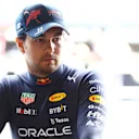 MELBOURNE, AUSTRALIA - APRIL 08: Sergio Perez of Mexico and Oracle Red Bull Racing prepares to drive in the garage during practice ahead of the F1 Grand Prix of Australia at Melbourne Grand Prix Circuit on April 08, 2022 in Melbourne, Australia. (Photo by Mark Thompson/Getty Images)