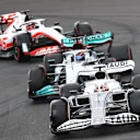 MELBOURNE, AUSTRALIA - APRIL 09: Pierre Gasly of France driving the (10) Scuderia AlphaTauri AT03 leads George Russell of Great Britain driving the (63) Mercedes AMG Petronas F1 Team W13 and Kevin Magnussen of Denmark driving the (20) Haas F1 VF-22 Ferrari on track during qualifying ahead of the F1 Grand Prix of Australia at Melbourne Grand Prix Circuit on April 09, 2022 in Melbourne, Australia. (Photo by Dan Istitene - Formula 1/Formula 1 via Getty Images)