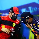 MELBOURNE, AUSTRALIA - APRIL 09: Pole position qualifier Charles Leclerc of Monaco and Ferrari and Third placed qualifier Sergio Perez of Mexico and Oracle Red Bull Racing talk in the press conference after qualifying ahead of the F1 Grand Prix of Australia at Melbourne Grand Prix Circuit on April 09, 2022 in Melbourne, Australia. (Photo by Dan Istitene - Formula 1/Formula 1 via Getty Images)