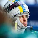 MELBOURNE, AUSTRALIA - APRIL 09: Sebastian Vettel of Germany and Aston Martin F1 Team looks on in the garage during qualifying ahead of the F1 Grand Prix of Australia at Melbourne Grand Prix Circuit on April 09, 2022 in Melbourne, Australia. (Photo by Mario Renzi - Formula 1/Formula 1 via Getty Images)