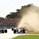 MELBOURNE, AUSTRALIA - APRIL 10: Mick Schumacher of Germany driving the (47) Haas F1 VF-22 Ferrari runs wide next to Kevin Magnussen of Denmark driving the (20) Haas F1 VF-22 Ferrari during the F1 Grand Prix of Australia at Melbourne Grand Prix Circuit on April 10, 2022 in Melbourne, Australia. (Photo by Robert Cianflone/Getty Images)