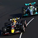 MELBOURNE, AUSTRALIA - APRIL 10: Sergio Perez of Mexico driving the (11) Oracle Red Bull Racing RB18 leads Lewis Hamilton of Great Britain driving the (44) Mercedes AMG Petronas F1 Team W13 during the F1 Grand Prix of Australia at Melbourne Grand Prix Circuit on April 10, 2022 in Melbourne, Australia. (Photo by Mark Thompson/Getty Images)