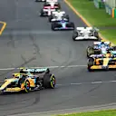 MELBOURNE, AUSTRALIA - APRIL 10: Lando Norris of Great Britain driving the (4) McLaren MCL36 Mercedes leads Daniel Ricciardo of Australia driving the (3) McLaren MCL36 Mercedes during the F1 Grand Prix of Australia at Melbourne Grand Prix Circuit on April 10, 2022 in Melbourne, Australia. (Photo by Dan Istitene - Formula 1/Formula 1 via Getty Images)