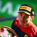 MELBOURNE, AUSTRALIA - APRIL 10: Race winner Charles Leclerc of Monaco and Ferrari celebrates on the podium during the F1 Grand Prix of Australia at Melbourne Grand Prix Circuit on April 10, 2022 in Melbourne, Australia. (Photo by Mario Renzi - Formula 1/Formula 1 via Getty Images)