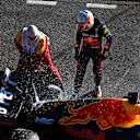 MELBOURNE, AUSTRALIA - APRIL 10: Max Verstappen of the Netherlands and Oracle Red Bull Racing and track marshals tend to the fire in his car after he retired from the race during the F1 Grand Prix of Australia at Melbourne Grand Prix Circuit on April 10, 2022 in Melbourne, Australia. (Photo by Clive Mason/Getty Images)
