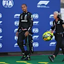 SPIELBERG, AUSTRIA - JULY 08: Lewis Hamilton of Great Britain and Mercedes walks in the Pitlane after a crash during qualifying ahead of the F1 Grand Prix of Austria at Red Bull Ring on July 08, 2022 in Spielberg, Austria. (Photo by Lars Baron - Formula 1/Formula 1 via Getty Images)