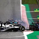 SPIELBERG, AUSTRIA - JULY 09: Pierre Gasly of France driving the (10) Scuderia AlphaTauri AT03 spins at the start during the F1 Grand Prix of Austria Sprint at Red Bull Ring on July 09, 2022 in Spielberg, Austria. (Photo by Bryn Lennon/Getty Images)