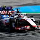 SPIELBERG, AUSTRIA - JULY 09: Kevin Magnussen of Denmark driving the (20) Haas F1 VF-22 Ferrari leads Esteban Ocon of France driving the (31) Alpine F1 A522 Renault during the F1 Grand Prix of Austria Sprint at Red Bull Ring on July 09, 2022 in Spielberg, Austria. (Photo by Rudy Carezzevoli - Formula 1/Formula 1 via Getty Images)