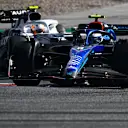 SPIELBERG, AUSTRIA - JULY 09: Nicholas Latifi of Canada driving the (6) Williams FW44 Mercedes leads Yuki Tsunoda of Japan driving the (22) Scuderia AlphaTauri AT03 during the F1 Grand Prix of Austria Sprint at Red Bull Ring on July 09, 2022 in Spielberg, Austria. (Photo by Rudy Carezzevoli - Formula 1/Formula 1 via Getty Images)