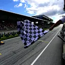 SPIELBERG, AUSTRIA - JULY 09: Sprint winner Max Verstappen of the Netherlands driving the (1) Oracle Red Bull Racing RB18 takes the chequered flag during the F1 Grand Prix of Austria Sprint at Red Bull Ring on July 09, 2022 in Spielberg, Austria. (Photo by Mario Renzi - Formula 1/Formula 1 via Getty Images)