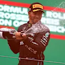 SPIELBERG, AUSTRIA - JULY 10: Third placed Lewis Hamilton of Great Britain and Mercedes celebrates on the podium during the F1 Grand Prix of Austria at Red Bull Ring on July 10, 2022 in Spielberg, Austria. (Photo by Bryn Lennon/Getty Images)