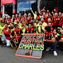 SPIELBERG, AUSTRIA - JULY 10: Race winner Charles Leclerc of Monaco and Ferrari celebrates with his team after the F1 Grand Prix of Austria at Red Bull Ring on July 10, 2022 in Spielberg, Austria. (Photo by Lars Baron - Formula 1/Formula 1 via Getty Images)