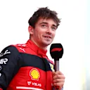 BAKU, AZERBAIJAN - JUNE 11: Pole position qualifier Charles Leclerc of Monaco and Ferrari talks to the media in parc ferme during qualifying ahead of the F1 Grand Prix of Azerbaijan at Baku City Circuit on June 11, 2022 in Baku, Azerbaijan. (Photo by Dan Istitene - Formula 1/Formula 1 via Getty Images)