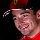 BAKU, AZERBAIJAN - JUNE 11: Pole position qualifier Charles Leclerc of Monaco and Ferrari talks to the media in the Paddock after qualifying ahead of the F1 Grand Prix of Azerbaijan at Baku City Circuit on June 11, 2022 in Baku, Azerbaijan. (Photo by Clive Rose/Getty Images)