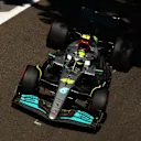 BAKU, AZERBAIJAN - JUNE 12: Lewis Hamilton of Great Britain driving the (44) Mercedes AMG Petronas F1 Team W13 on his way to the grid ahead of the F1 Grand Prix of Azerbaijan at Baku City Circuit on June 12, 2022 in Baku, Azerbaijan. (Photo by Clive Rose/Getty Images)