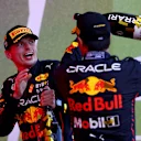 BAKU, AZERBAIJAN - JUNE 12: Race winner Max Verstappen of the Netherlands and Oracle Red Bull Racing and Second placed Sergio Perez of Mexico and Oracle Red Bull Racing celebrate on the podium during the F1 Grand Prix of Azerbaijan at Baku City Circuit on June 12, 2022 in Baku, Azerbaijan. (Photo by Dan Istitene - Formula 1/Formula 1 via Getty Images)