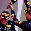 BAKU, AZERBAIJAN - JUNE 12: Race winner Max Verstappen of the Netherlands and Oracle Red Bull Racing and Second placed Sergio Perez of Mexico and Oracle Red Bull Racing celebrate on the podium during the F1 Grand Prix of Azerbaijan at Baku City Circuit on June 12, 2022 in Baku, Azerbaijan. (Photo by Dan Istitene - Formula 1/Formula 1 via Getty Images)