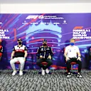 BAHRAIN, BAHRAIN - MARCH 18: (L-R) Carlos Sainz of Spain and Ferrari, Valtteri Bottas of Finland and Alfa Romeo F1, Sergio Perez of Mexico and Oracle Red Bull Racing, Kevin Magnussen of Denmark and Haas F1 and Daniel Ricciardo of Australia and McLaren attend the Drivers Press Conference before practice ahead of the F1 Grand Prix of Bahrain at Bahrain International Circuit on March 18, 2022 in Bahrain, Bahrain. (Photo by Clive Rose/Getty Images)